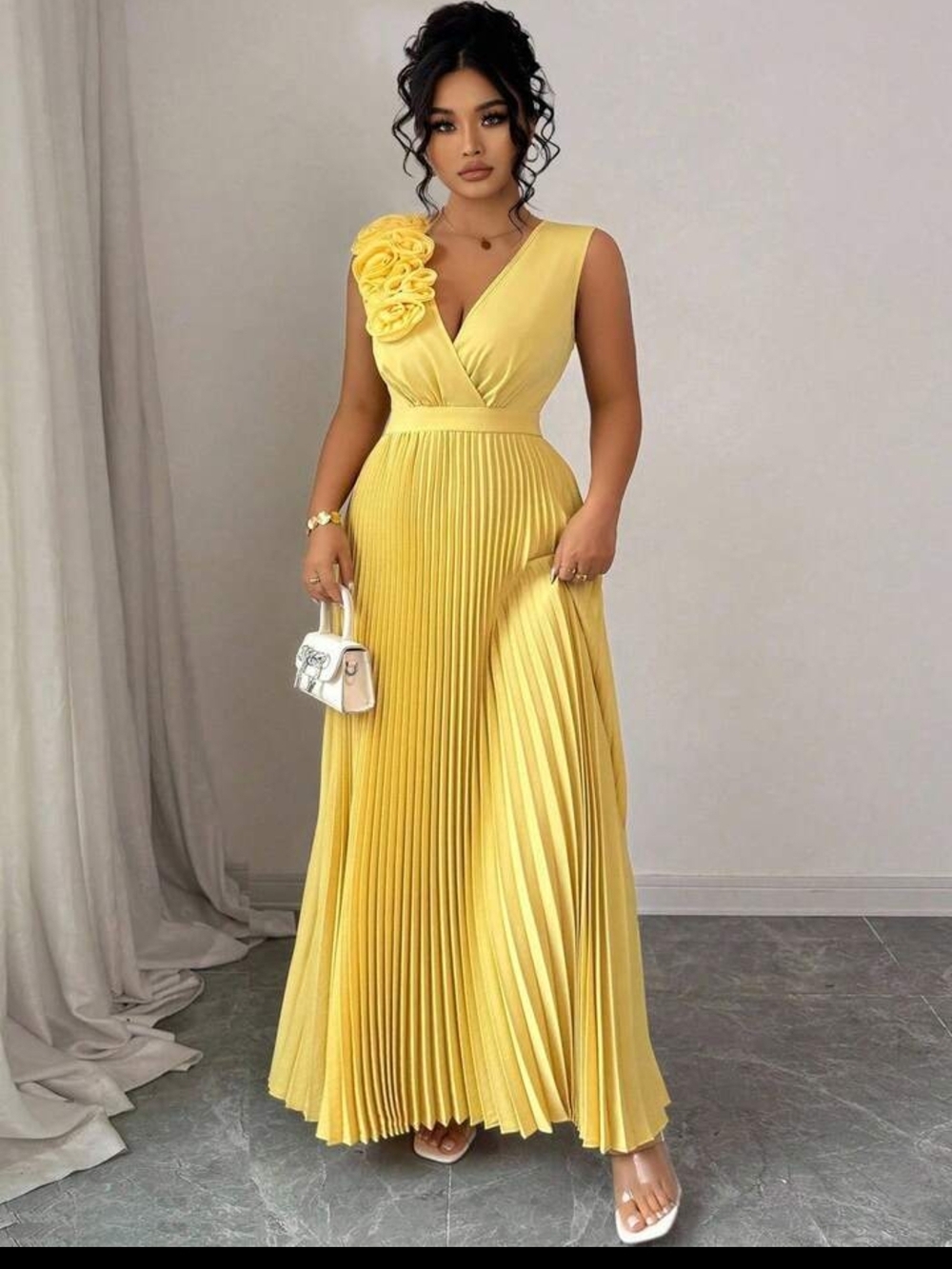 Elegant Yellow Pleated Maxi Dress with Floral Shoulder Detail